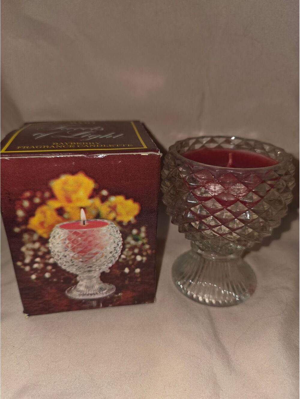 Avon facets of lights candle